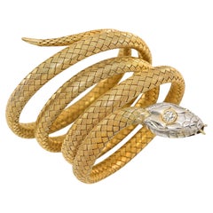 Pulsera vintage con forma de serpiente, de oro amarillo de 18k y oro blanco de 14k con diamantes