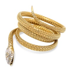 Pulsera vintage con forma de serpiente, de oro amarillo de 18k y oro blanco de 14k con diamantes