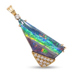 Pendentif vintage en or jaune, opale boulder et diamants