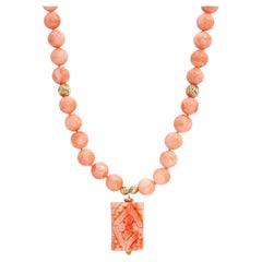 14k Yellow Gold Salmon Coral Beaded Necklace with Carved Coral Pendant