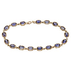 Vintage-Armband aus 14-karätigem Gelbgold mit Iolith-Gliedern