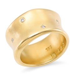 Bague vintage Robert Lee Morris en or jaune 18 carats, à bande concave parsemée de diamants
