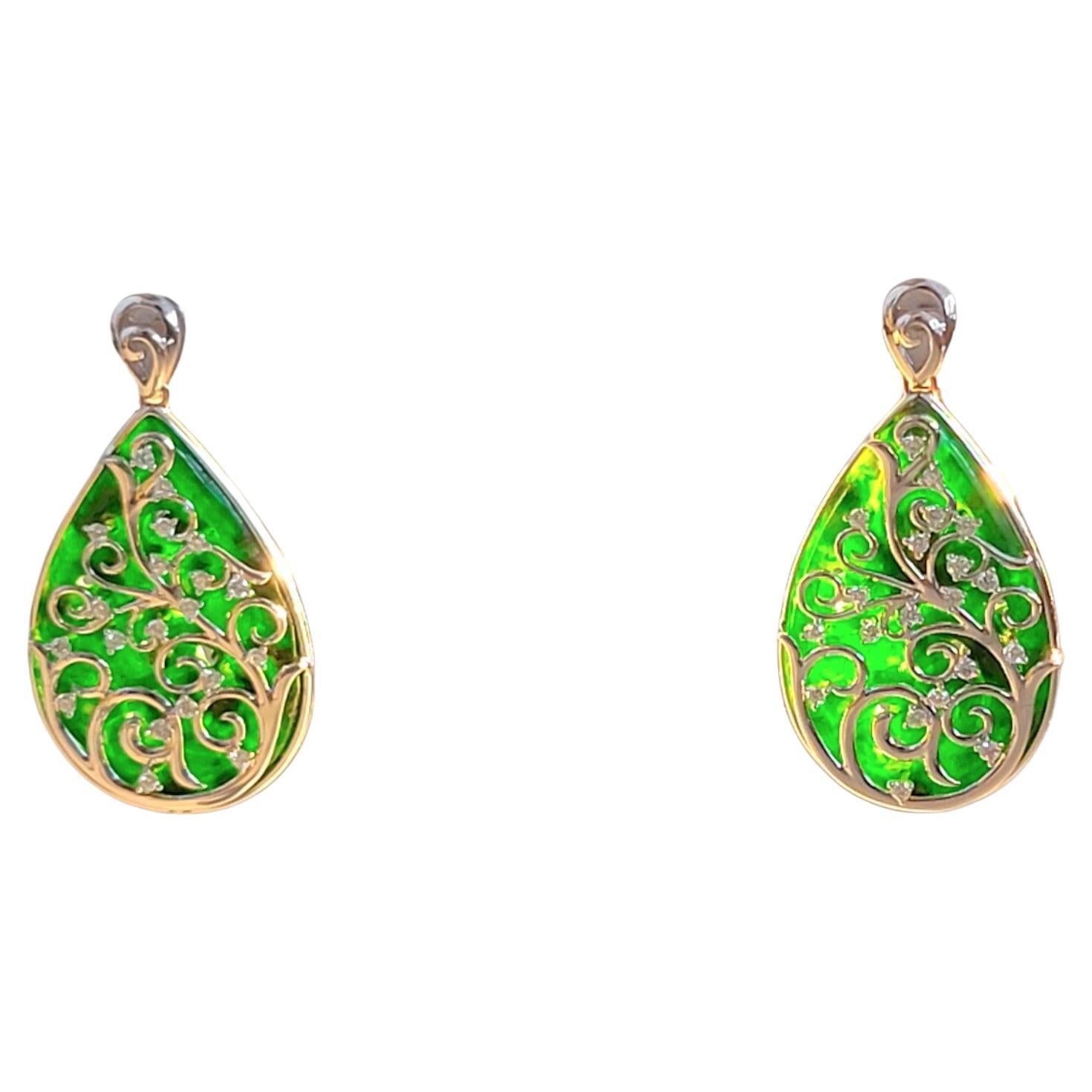 Jade Laboratory Certified Handmade Earrings with Untreated 100% Natural Burmese A-Jade, 18K White Gold, and White Round Brilliant Diamonds. This piece is completely made in Hong Kong. 


These Earrings were designed by our founder, and hand carved