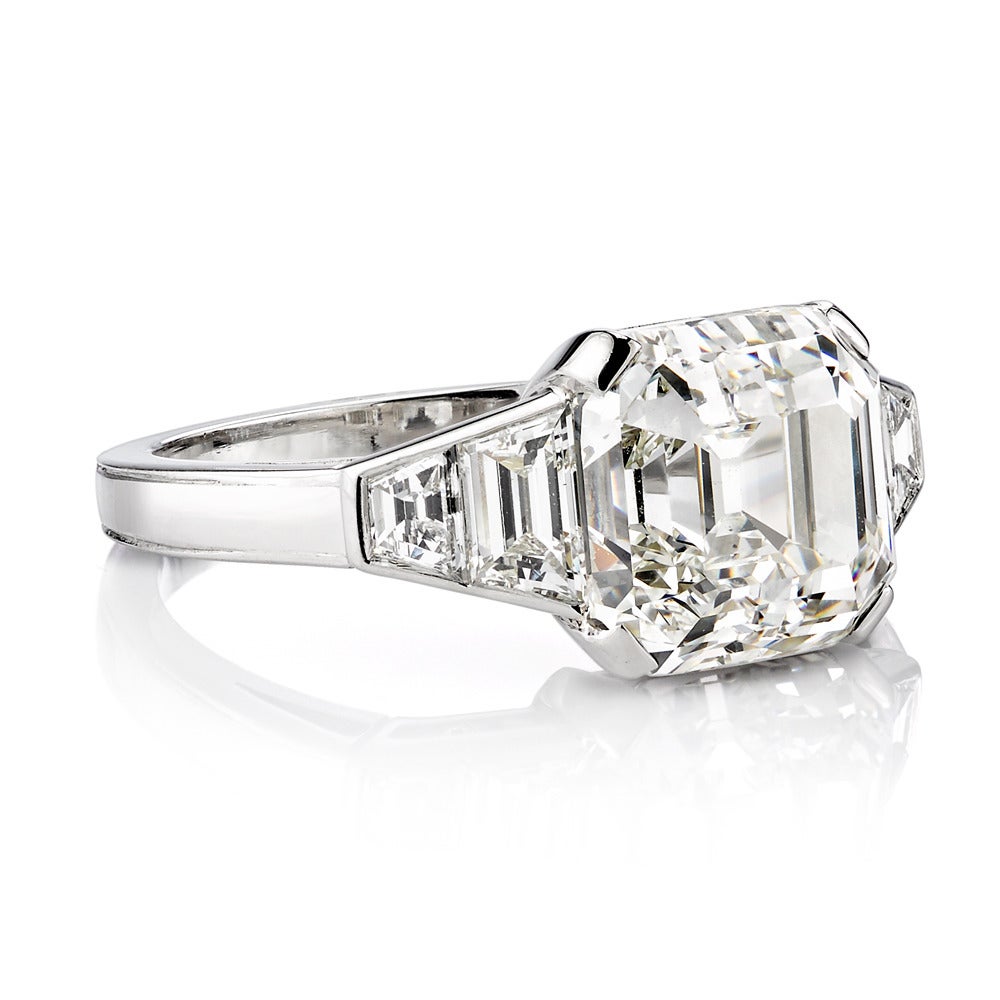 4.65ct K/VS1 GIA certified Asscher cut diamond set in a handcrafted platinum mounting. A clean and classic design featuring trapezoid accent diamonds.