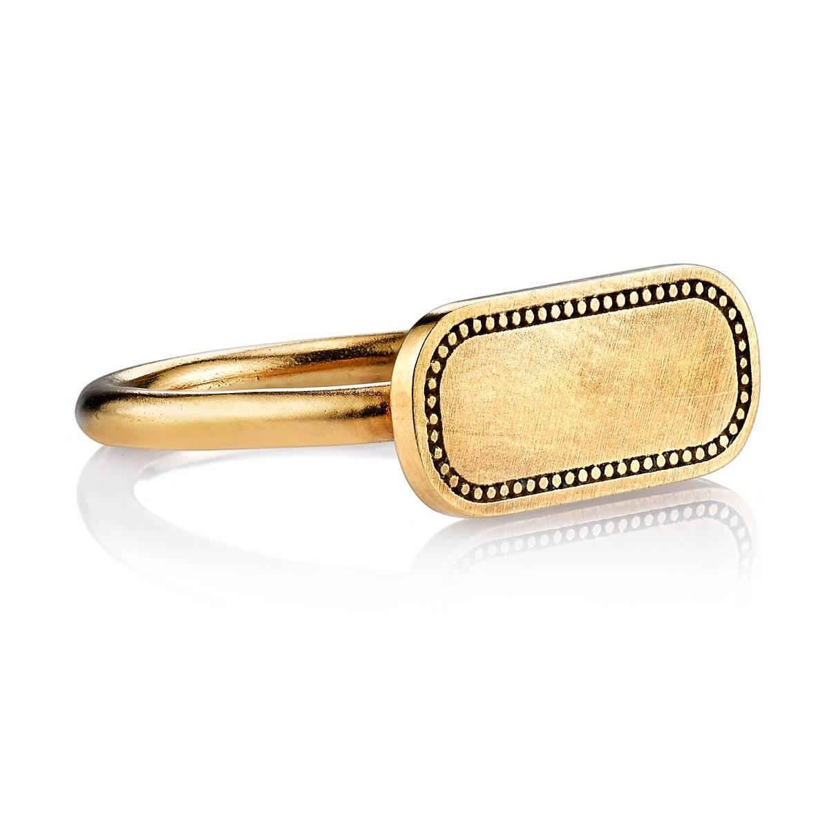 Vintage inspired handcrafted 18k yellow gold signet ring with an oxidized beaded frame. A modern take on the classic signet ring. Make it personal! Our Milo ring includes engraving of up to three letters.

Please inquire about