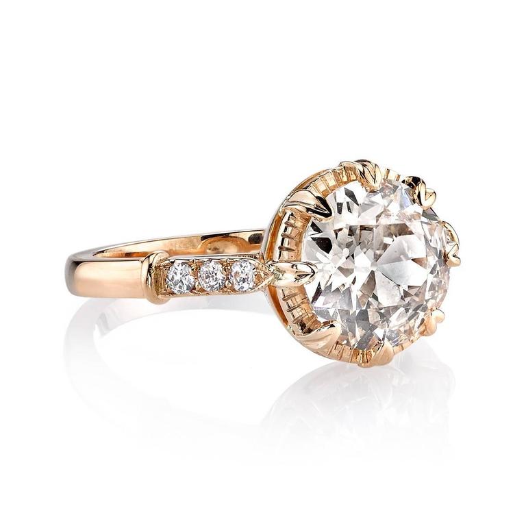 2.16ct Top Light Brown/VS old European cut diamond set in a handcrafted 18K rose gold mounting. A sweet solitaire design featuring a unique illusion and low profile.