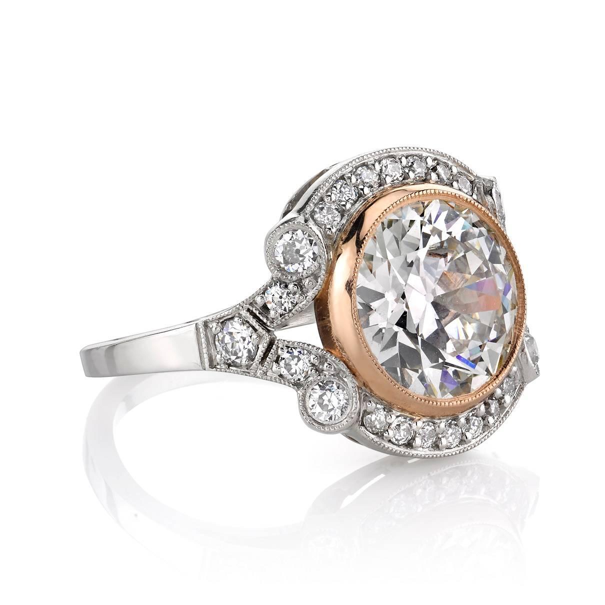 3.05ct J/VS1 GIA certified old European cut diamond set in a handcrafted platinum and 18k rose gold mounting.