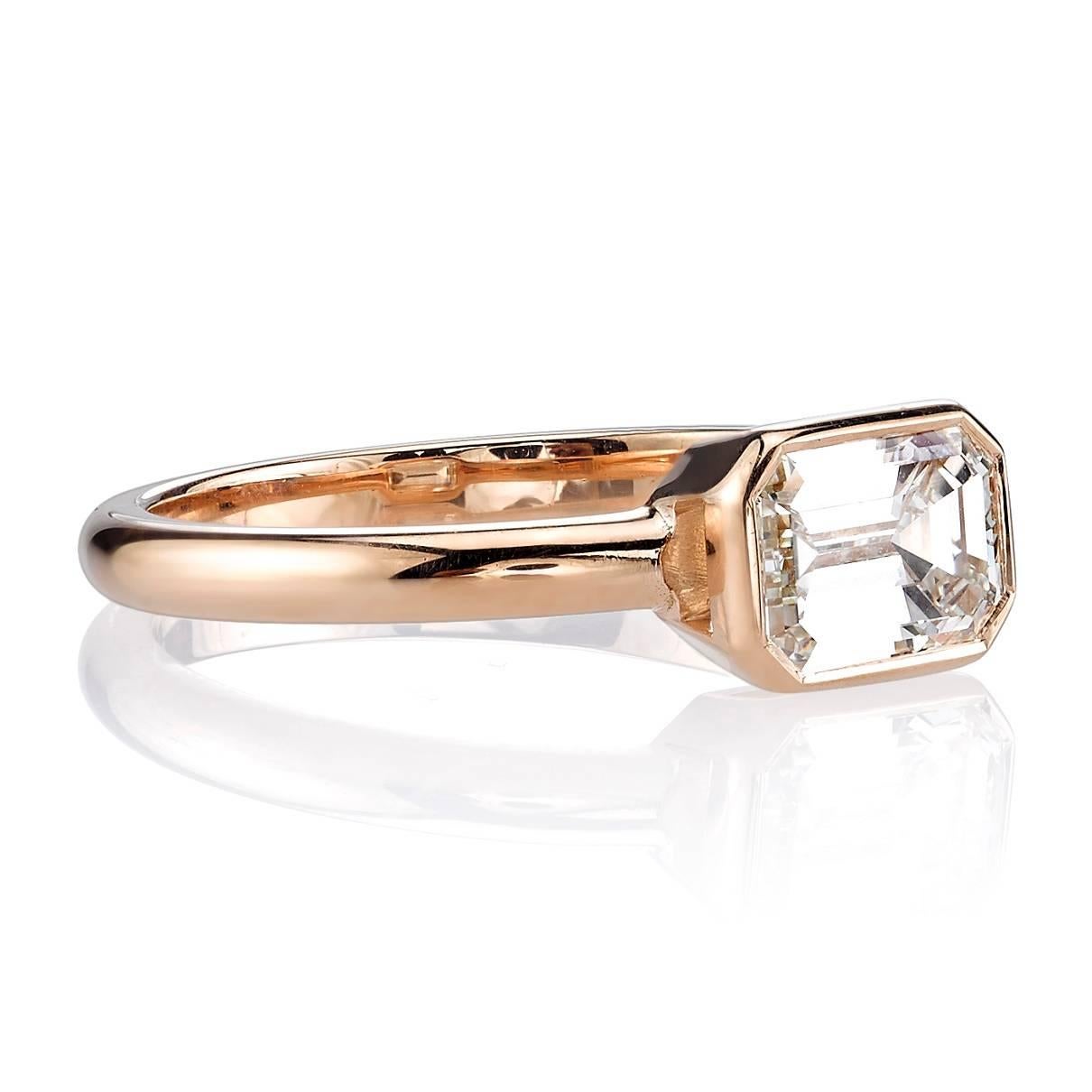 1.26ct K/VVS1 HRD certified Emerald cut diamond set in a handcrafted 18k rose gold setting. A unique take on a solitaire design.