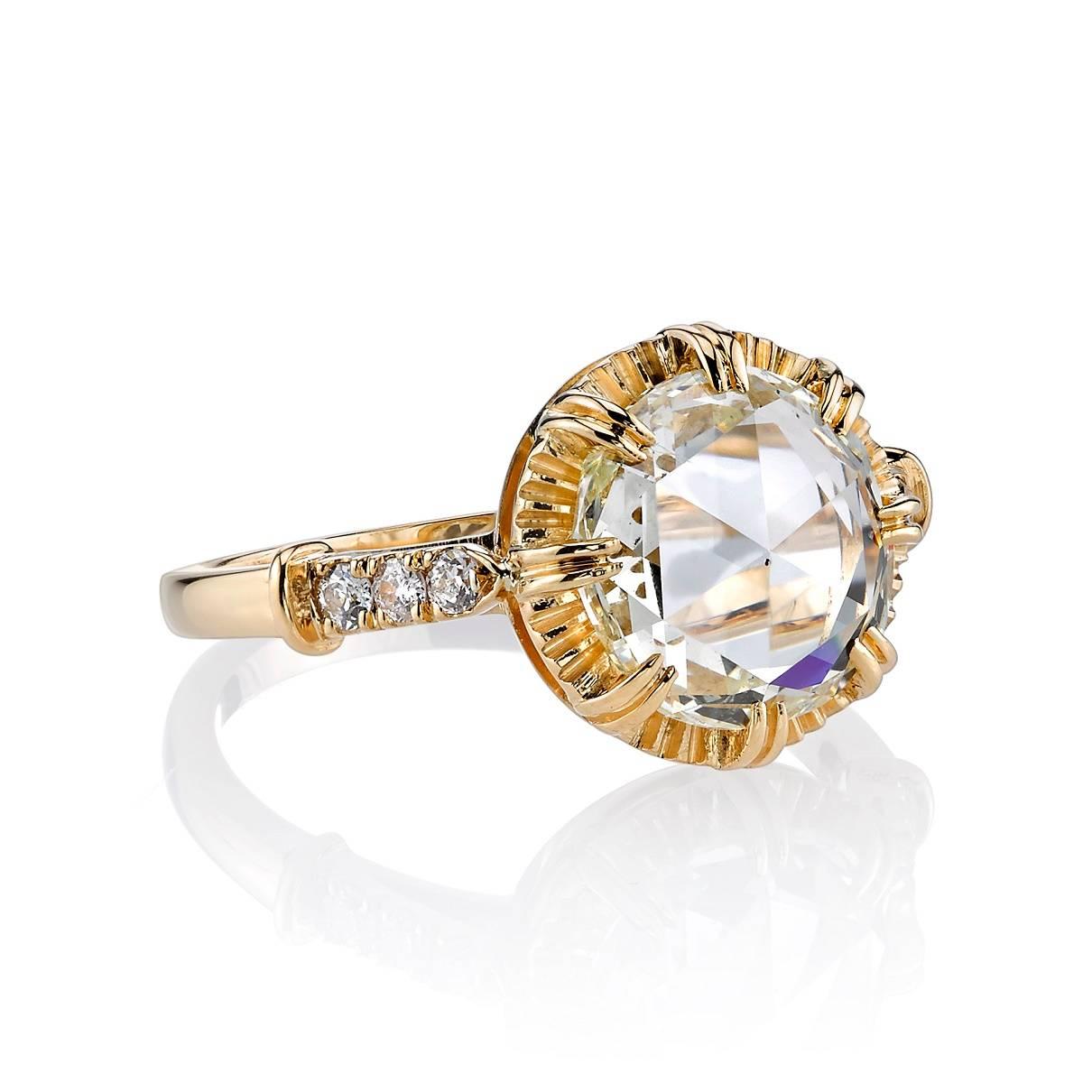 2.45ct K/SI1 EGL certified Rose cut diamond set in a handcrafted 18K yellow gold mounting. A sweet solitaire design featuring a unique illusion and low profile.