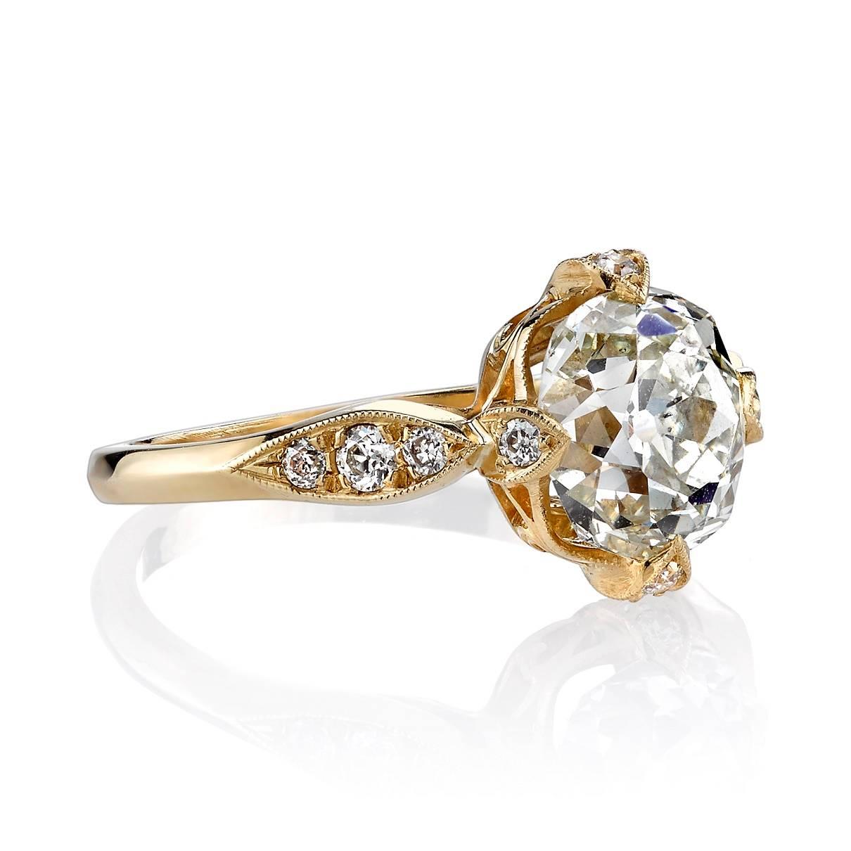 2.32ct K/SI1 EGL certified vintage Cushion cut diamond set in a handcrafted 18k yellow gold mounting.