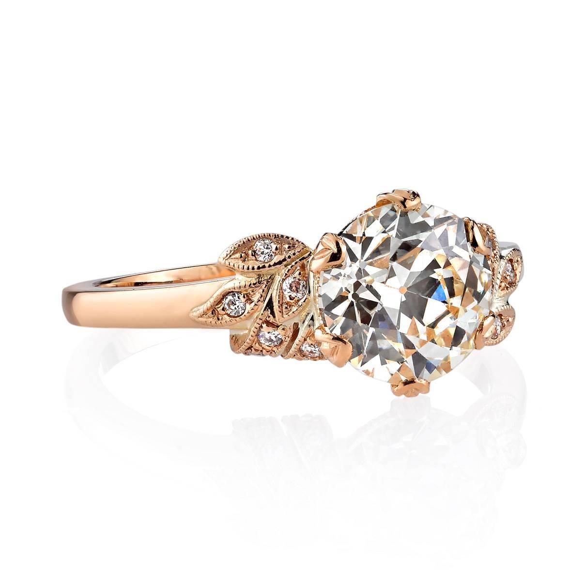 1.84ct L/VS1 EGL certified old European cut diamond set in a handcrafted 18k rose gold mounting. A classic Victorian inspired design featuring floral motifs.