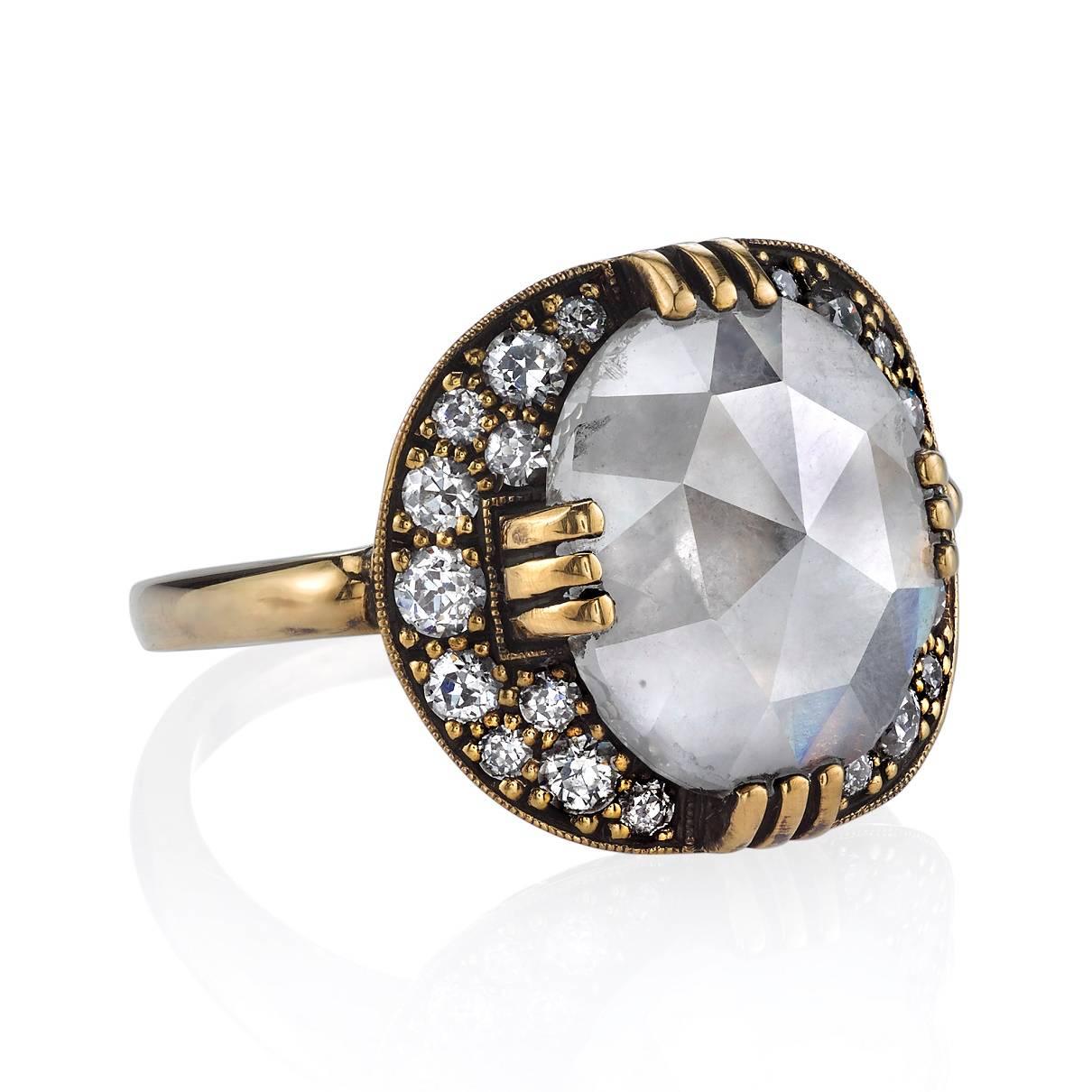 3.85ct white Rose cut diamond set in a handcrafted 18k oxidized yellow gold mounting. 