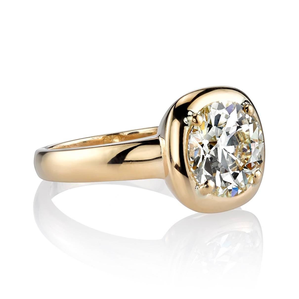 2.48ct M/VVS2 old European cut diamond EGL certified and set in a handcrafted 18k yellow gold mounting.  Smooth lines and bold metal give this ring a contemporary yet classic look.