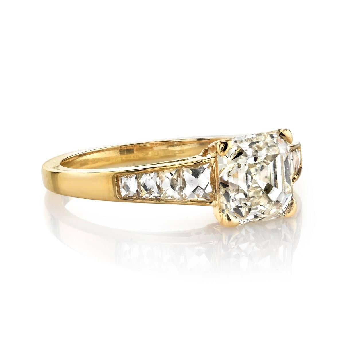1.57ct J/VS2 EGL certified Asscher cut diamond set in a handcrafted 18k yellow gold mounting.