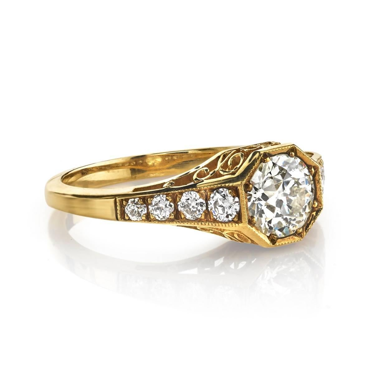 0.73ct K/VS1 EGL certified old European cut diamond set in a handcrafted 18k oxidized yellow gold mounting.