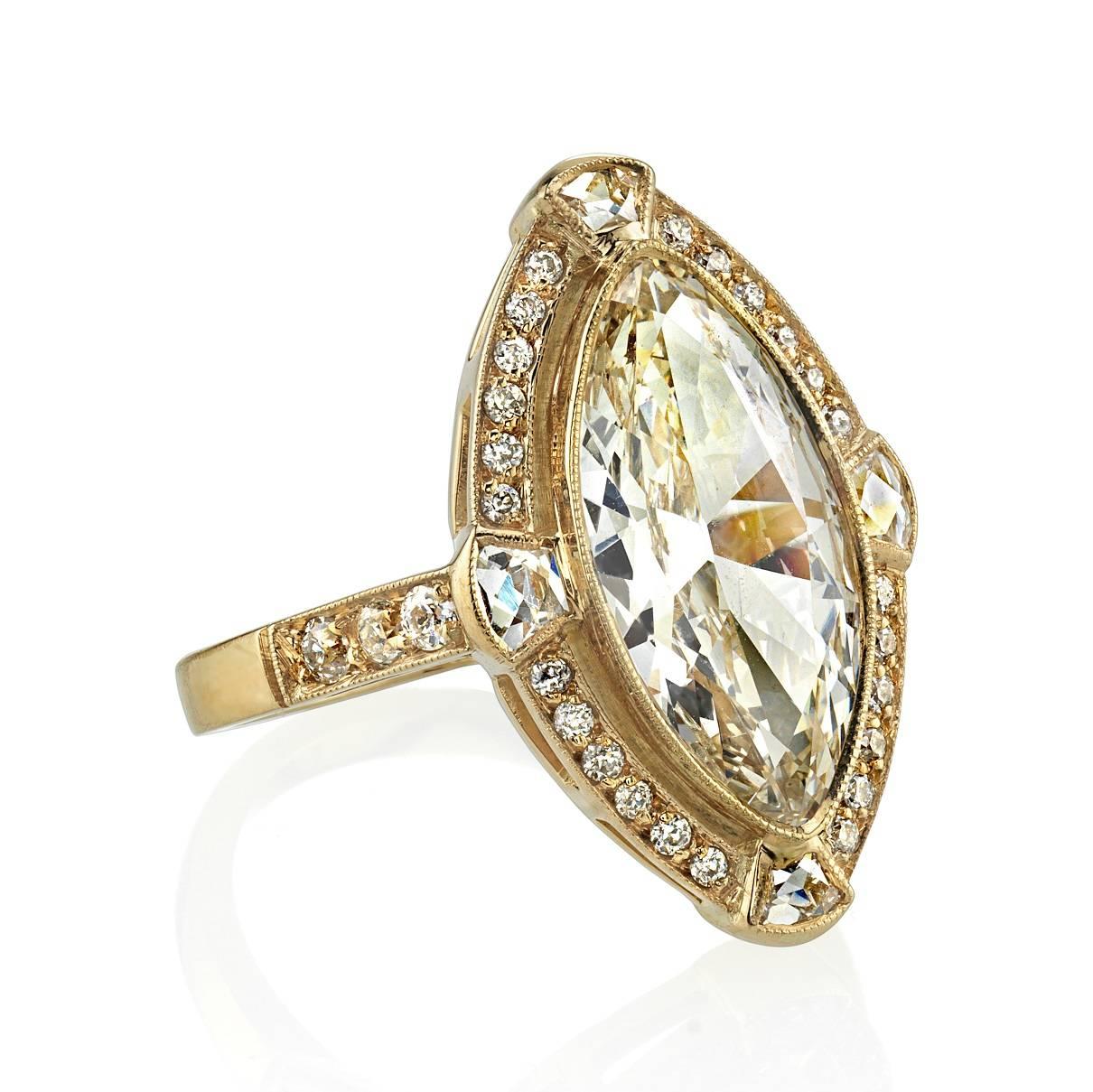 2.77ct K/VS1 GIA certified Moval cut diamond set in a handcrafted 18k yellow gold mounting. 