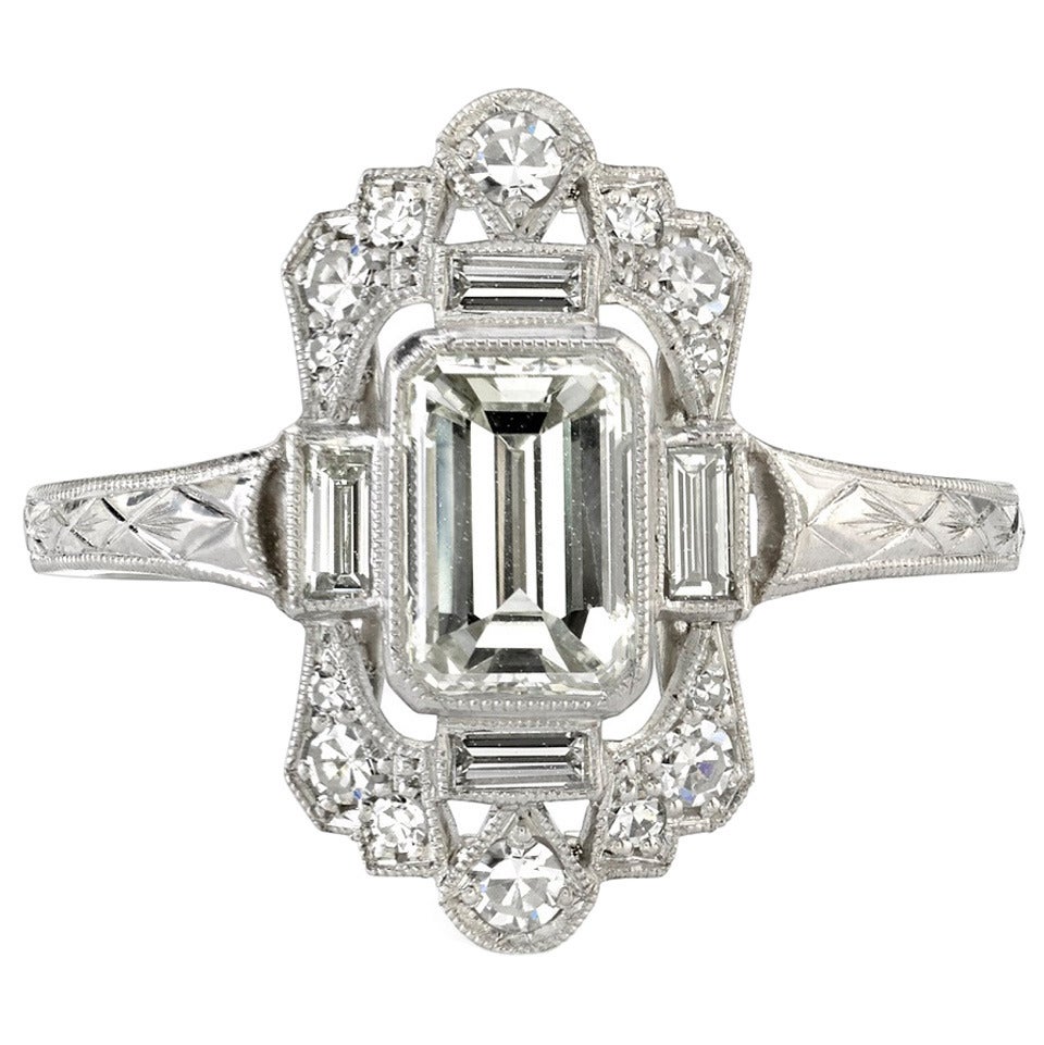 Intricate Emerald Cut Diamond Engagement Ring