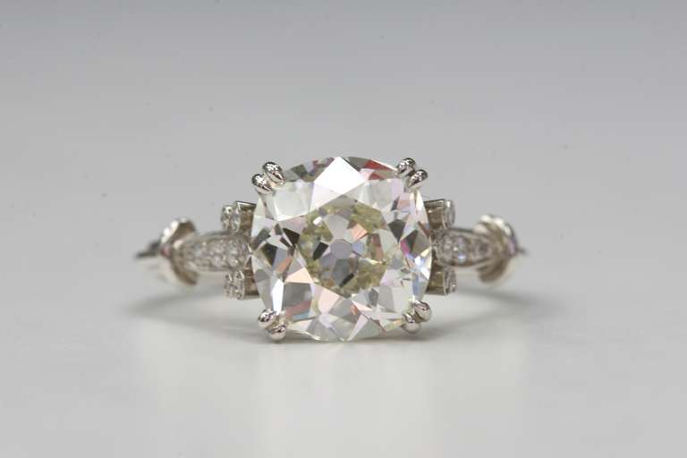 2.87ct K/VS2 Cushion cut diamond that is EGL certified and set in a platinum hand crafted 