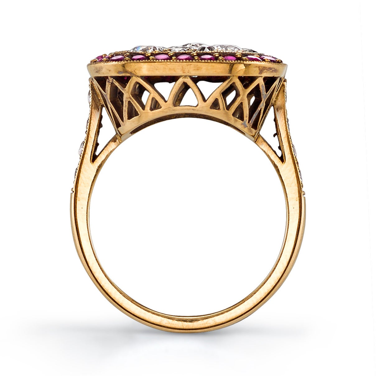 2.75ctw old European, old Mine, Round Brilliant, Single cut and vintage Cushion cut diamonds with 0.93ctw Ruby surround set in handcrafted 18K oxidized yellow gold mounting. Prices may vary according to total diamond weight. 

Measurements 22mm x