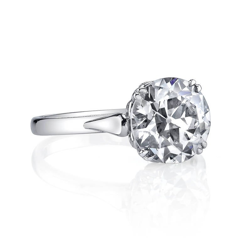 3.01ct K/S1 EGL certified old European cut diamond set in a platinum handcrafted mounting.