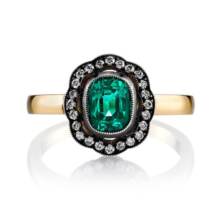 0.89ct Emerald set in a 18K Yellow Gold-Silver hand crafted 