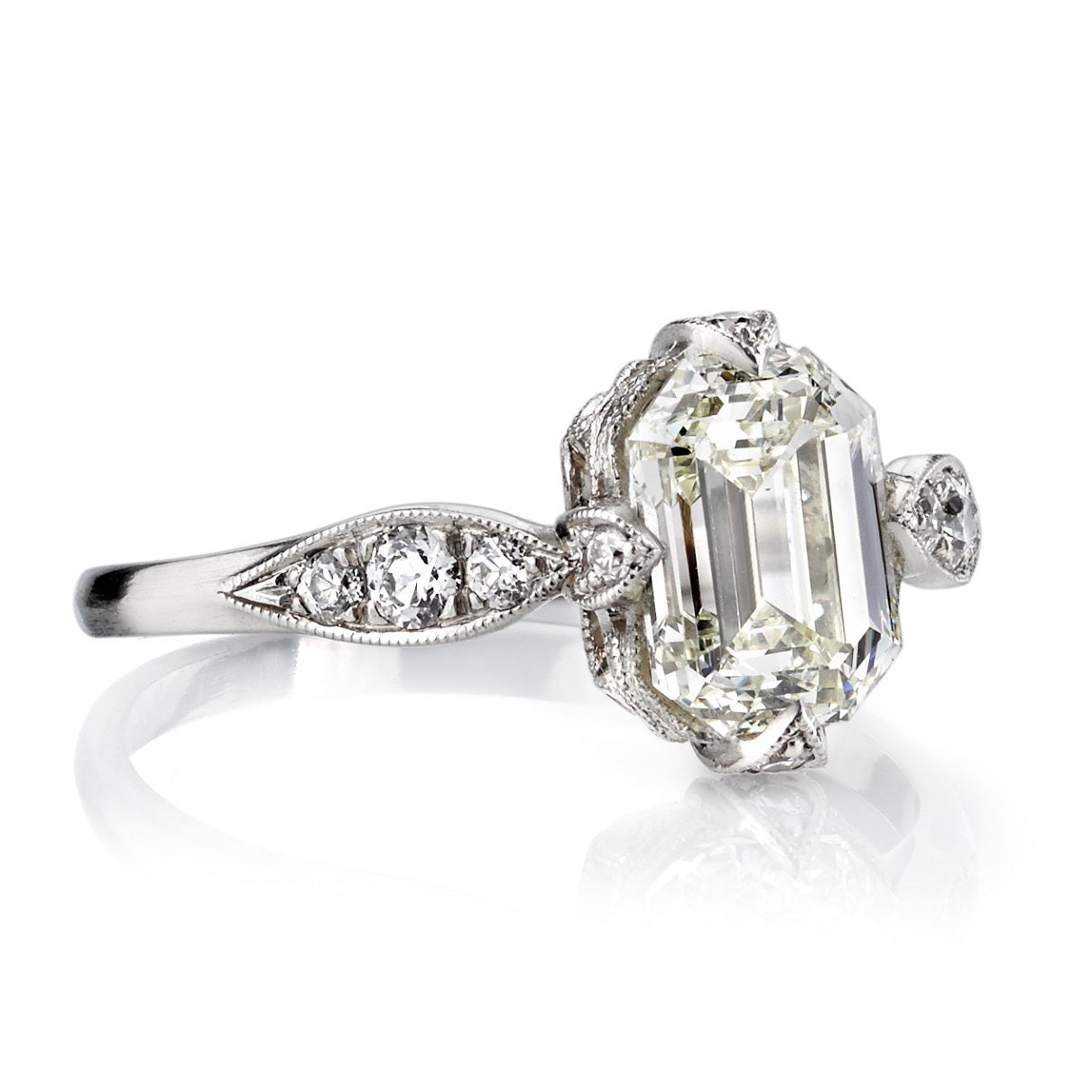 1.52ct K/VS1 Emerald cut diamond that is EGL certified and set in a platinum handcrafted 