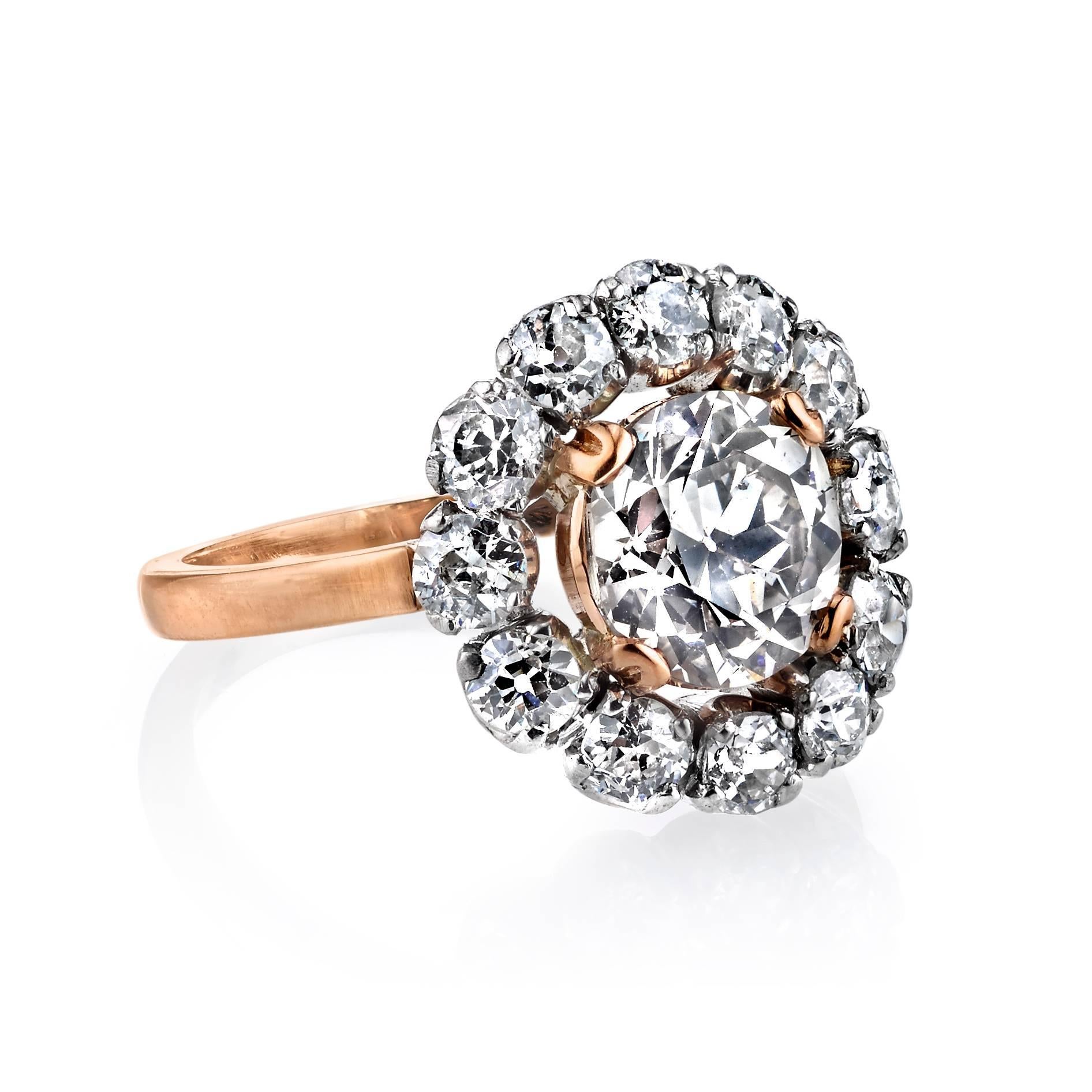 2.12ct Rose Brown/ SI1 old Mine cut diamond with 1.10ctw surround diamonds set in a vintage 18k Rose gold and platinum mounting. Circa 1920. A beautiful two tone cluster ring.