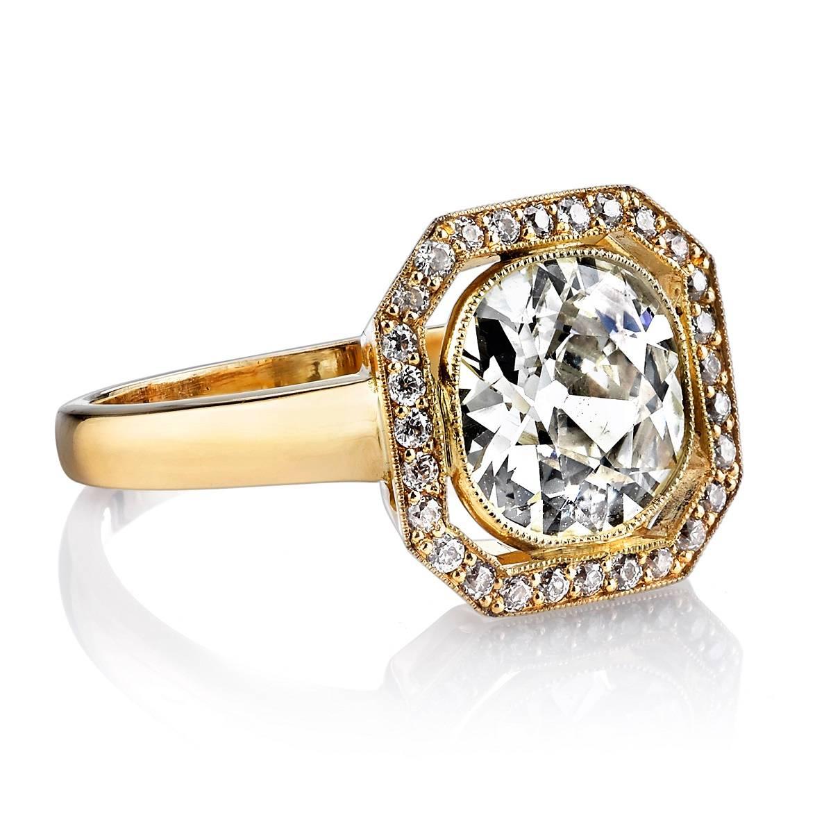 2.18ct L/SI1 EGL certified Cushion cut diamond set in a handcrafted 18k yellow gold mounting.