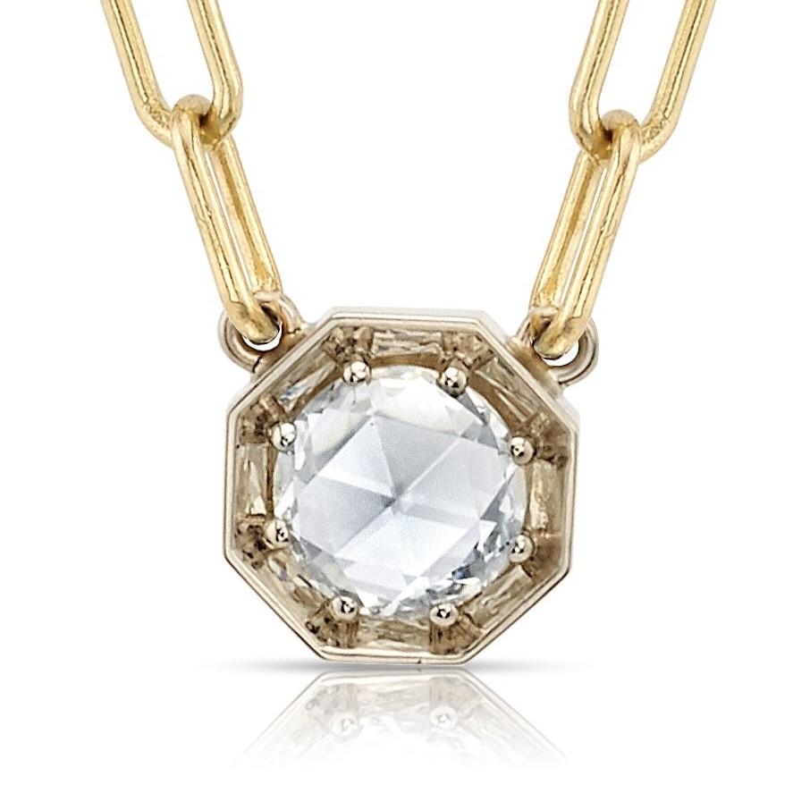 0.62ctw J/VVS2 GIA certified Rose cut diamond set in a handcrafted 18K champagne gold pendant. Pendant is set on a handcrafted 18K yellow gold bond chain.

Necklace measures 17