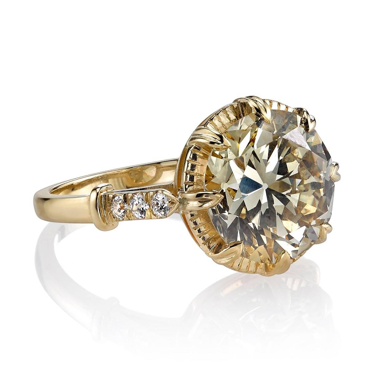 4.44ct Brown-Yellow/VS1 old European cut diamond GIA certified and set in a handcrafted 18k yellow gold mounting.  A sweet solitaire design featuring a unique illusion and low profile.