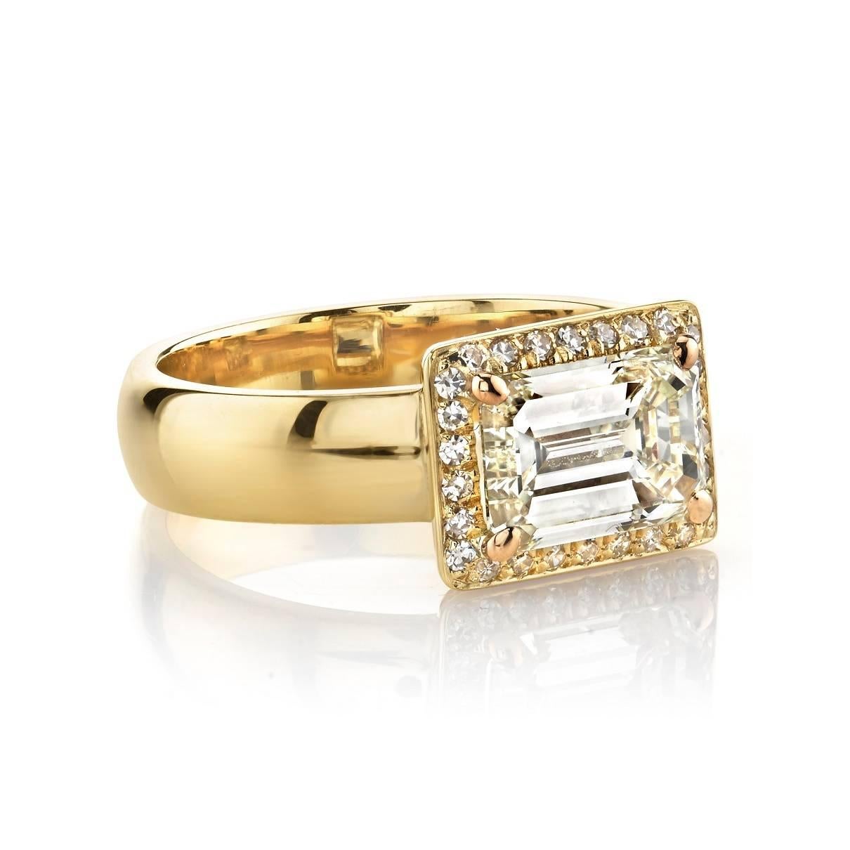 2.01ct K/VVS2 EGL certified Emerald Cut diamond set in a handcrafted 18k yellow gold mounting. 