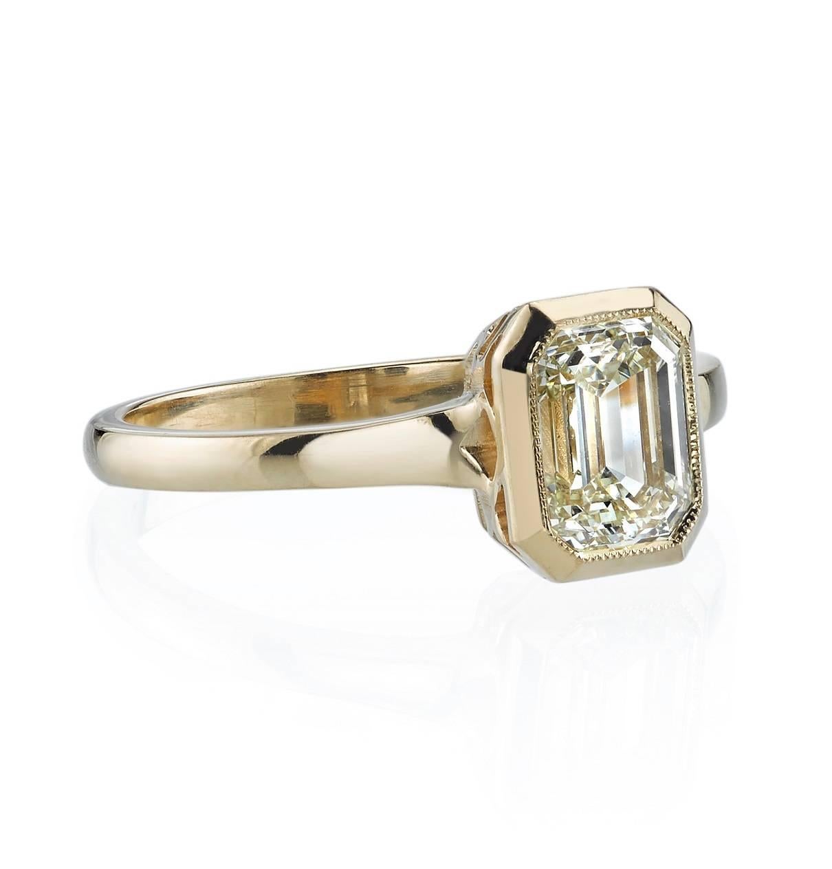 1.20ct N/VS1 Emerald cut diamond GIA certified and set in a handcrafted 18k yellow gold mounting.
