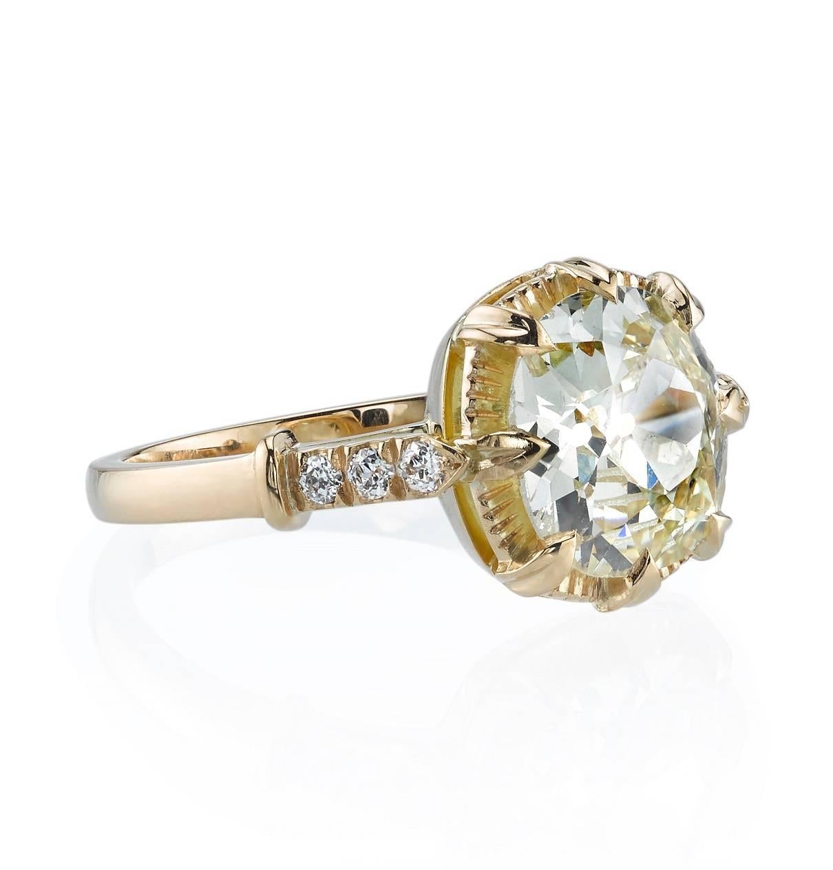 2.55ct OP/VS2 Cushion cut diamond EGL certified and set in a handcrafted 18k yellow gold mounting.  A sweet solitaire design featuring a unique illusion and low profile.