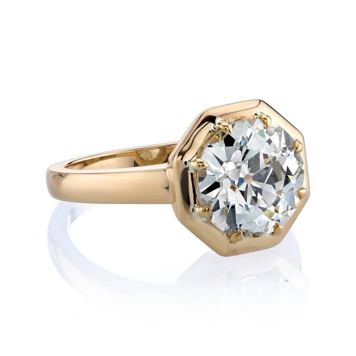 3.32ct M/VS1 GIA certified old European cut diamond prong set in a handcrafted octagonal 18k yellow gold mounting.  

Ring is a size 6 and can be sized to fit. 