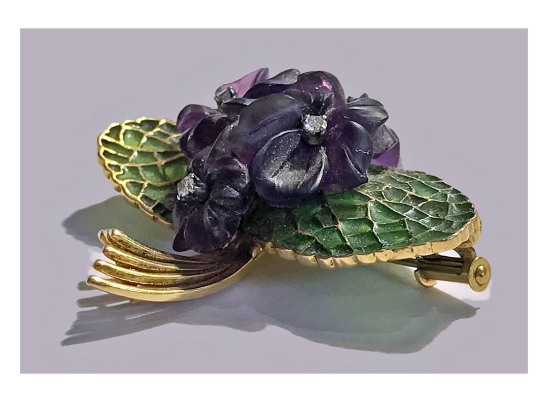 Plique-a-Jour Enamel Amethyst Diamond 18K Gold Violet Brooch, Austria C.1950. The brooch with four foliate amethyst colour flowers, inset with four single cut diamonds, the surrounding foliage of green plique-a-jour and gold enamel leaf. Gold marks