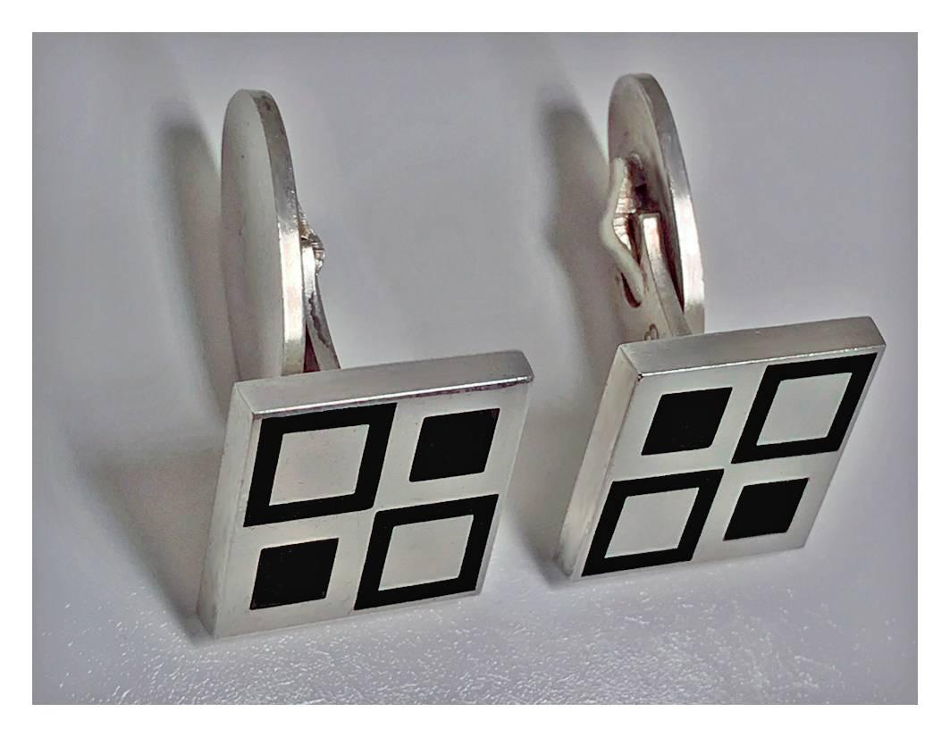 Georg Jensen ‘Mosaic’ green enamel Cufflinks, C.1980. Solid Sterling dark green enamel squares cufflinks with various sized open and solid squares in green enamel, oval toggle back fitting - marked with post 1945 marks for Georg Jensen of Copenhagen