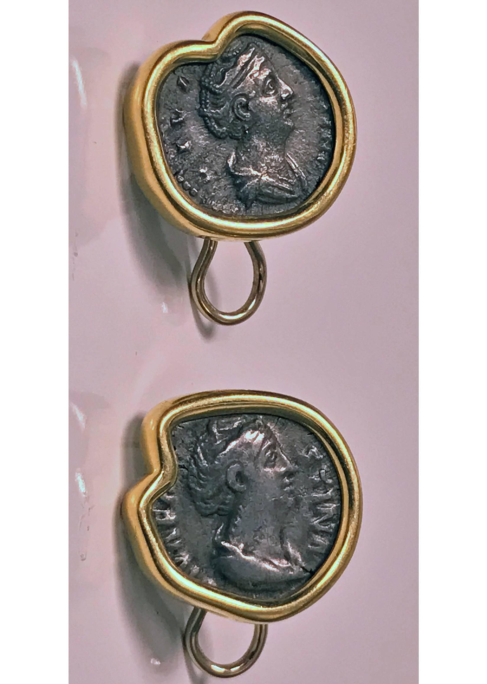 Pair of 18K custom mounted Ancient Coin Earrings, C.1990. Each earring depicting an ancient roman coin, custom mounted with yellow gold solid bezel surround, post and clip fitments stamped 750 and 1198F1 Italian marks for Il Conio Artistico