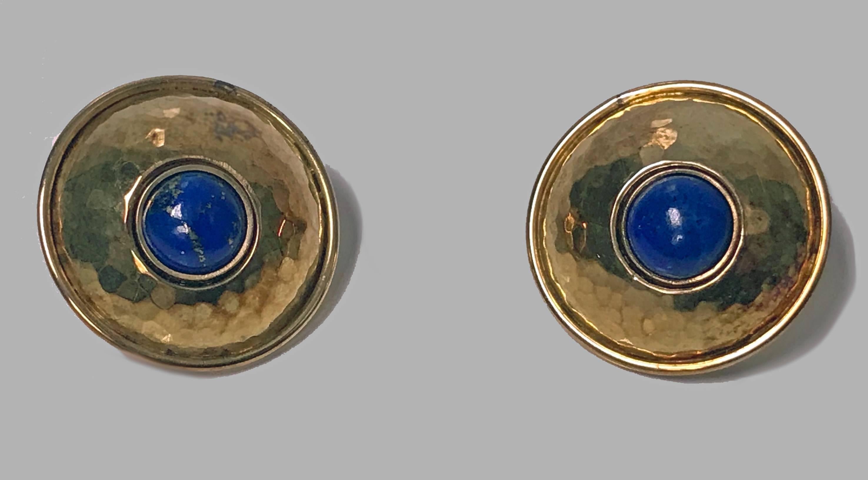 Rare Pair of Walter Schluep 18K Lapis Earrings. The handmade hand hammered Earrings of offset sphere dome form, bezel set with cabochon lapis. Signed on reverse, Schluep 18K. Clip fitments. Diameter: 20.04 mm. Item Weight: 12.61 grams. Spanish born,