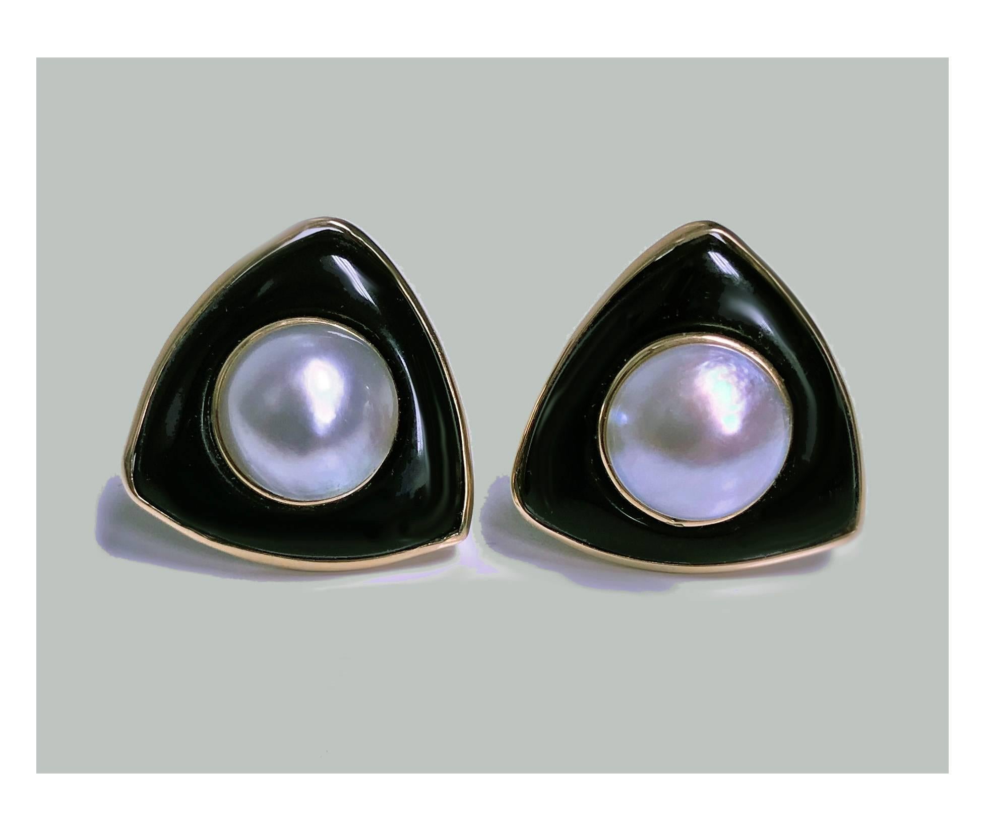 Black Onyx  Art Deco style Earrings with Mabe pearls set in 14K yellow gold, C.1970. and 14K yellow gold post and butterfly disc backs.Earrings measure approximately 25 x 25 mm. Total Item Weight: 16.56 grams