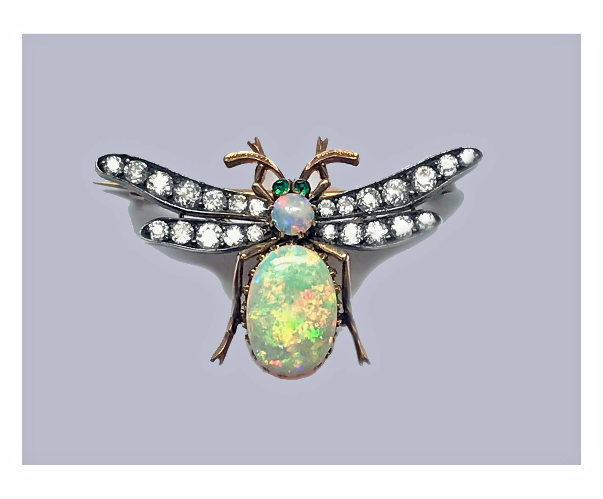 Fine 19th century Opal and Diamond Bee Brooch Pendant, English C.1890. The Brooch with removable reverse fitment convertible to pendant, abdomen and thorax set with oval and round cabochon opal, good play of colour, the wings set with twenty four