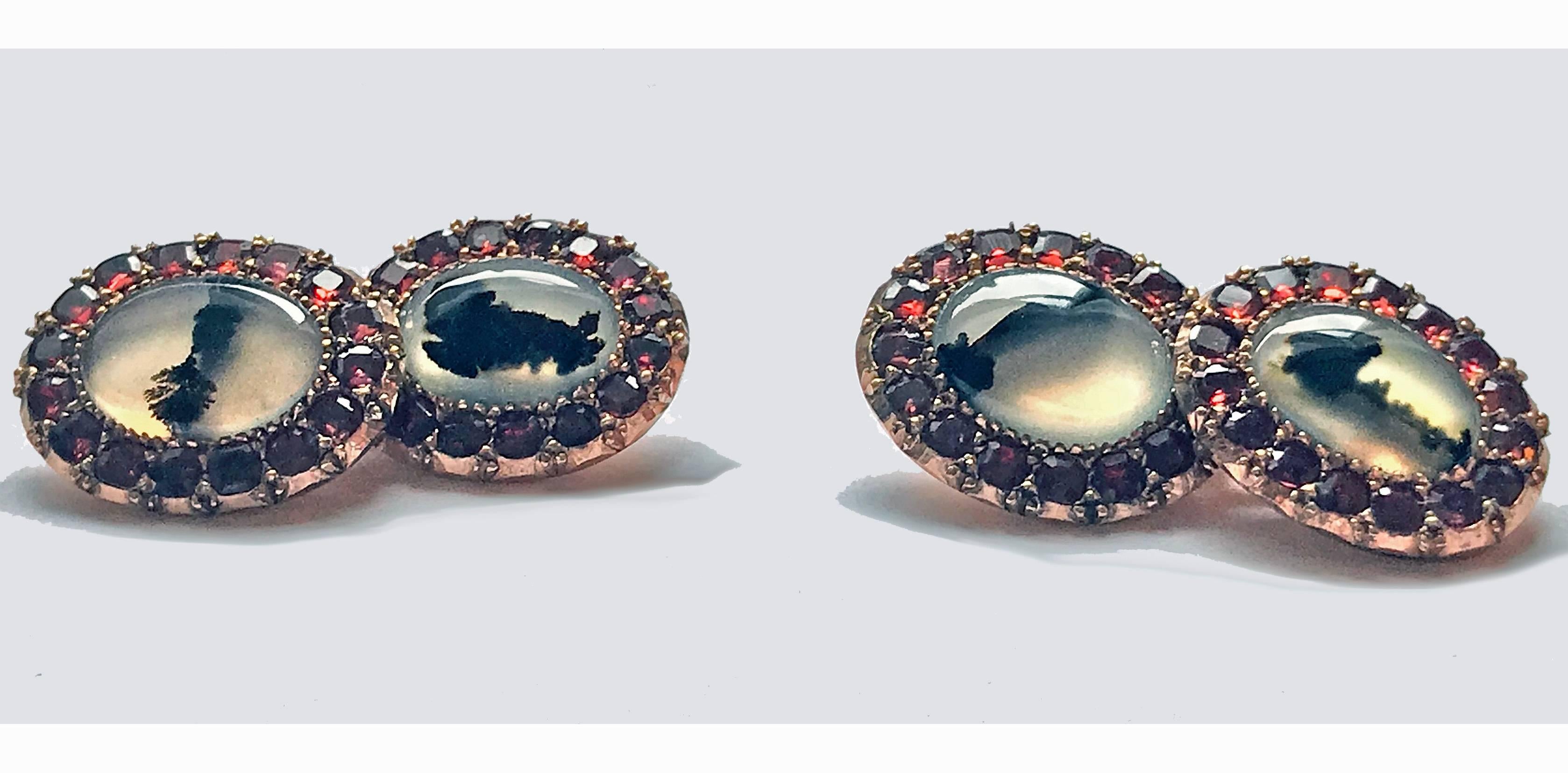 Pair of Georgian Ruby Moss Agate Cufflinks in gold, English C.1800. The double link cufflinks of oval shape set with moss agate with a surround of closed back rubies, chain link between. Fitted box. Each oval link measures approximately  15.50 x