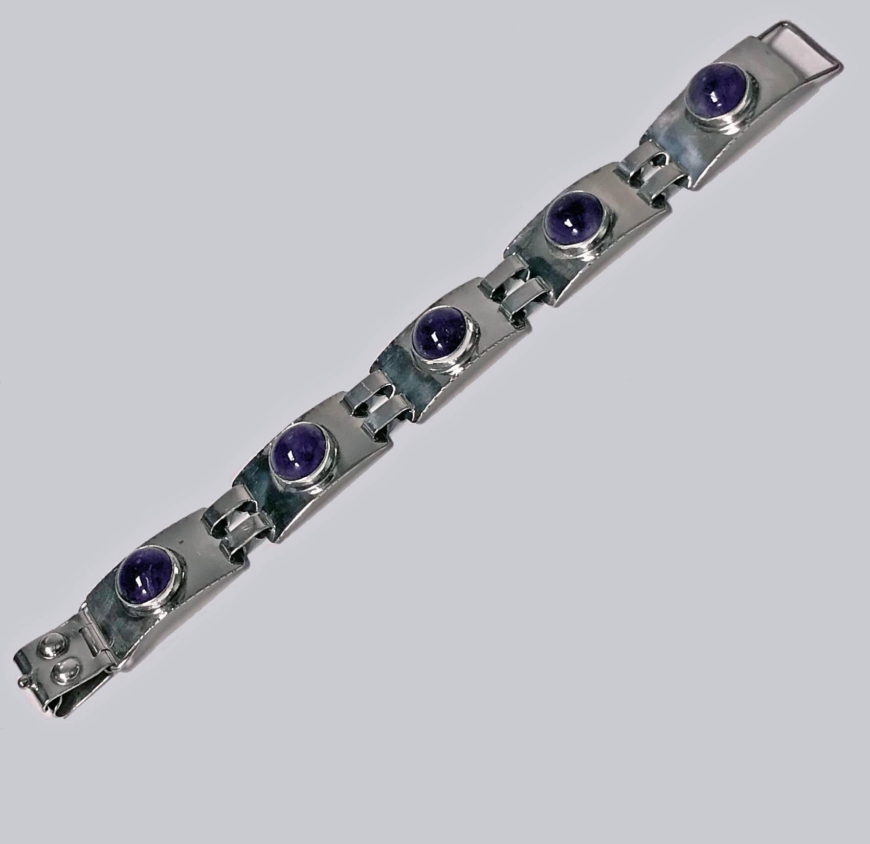 Arts and Crafts George Kramer Amethyst and Silver Bracelet, Germany C.1920. Georg Kramer was founded in 1771 and continued for four generations until 1932, thereafter continued by Walter Kramer. In 1890, the hallmark "GK" was introduced in