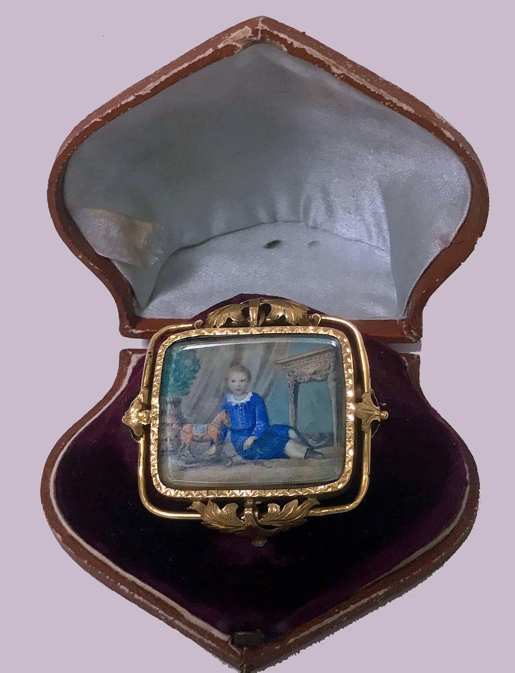 Antique Portrait Miniature original beveled crystal, Swiss, C.1800, attributed Anton Graff, depicting a boy with pull toy and orange tree, foliate gold (tests as 18K) frame (minor solder at reverse), fitted box. Anton Graff (1736-1813) was among the