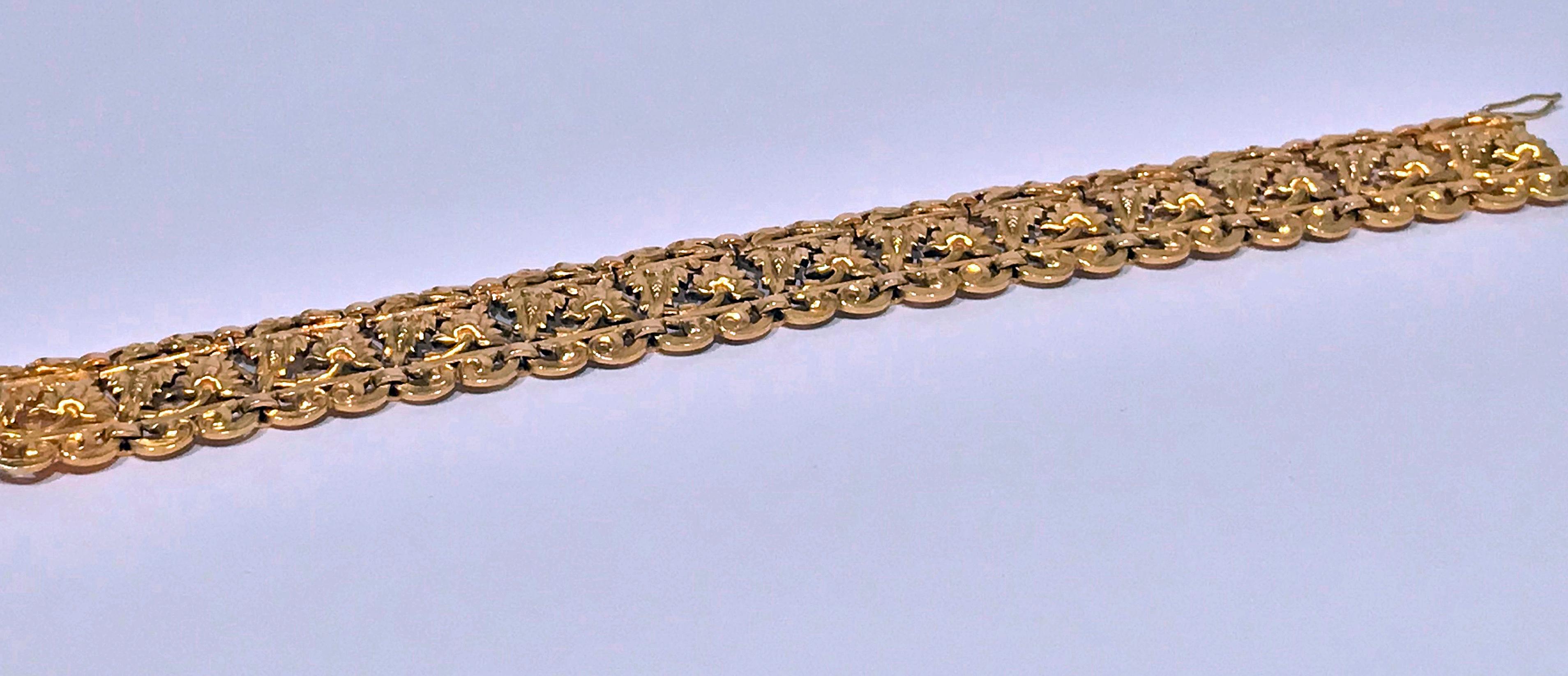 1930’s 18K Gold Bracelet. The bracelet with pierced foliate pine cone hinged rectangular links hinged links, tongue and box clap fastener (possibly later clasp) Width of links: 0.75 inches. Length: 7.00 inches. Possibly Scandinavian Total Item