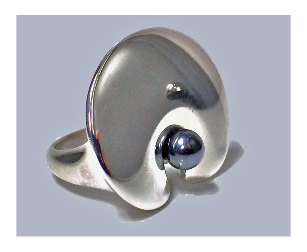 Rare Georg Jensen Lilypad Ring designed by Nanna Ditzel, Denmark, C. 1970. The ring in the form of a lily pad offset with hematite sphere. Present Ring size: 5 1/2. Item Weight: 16.01 grams. Fully marked for Georg Jensen, ND for Nanna Ditzel and