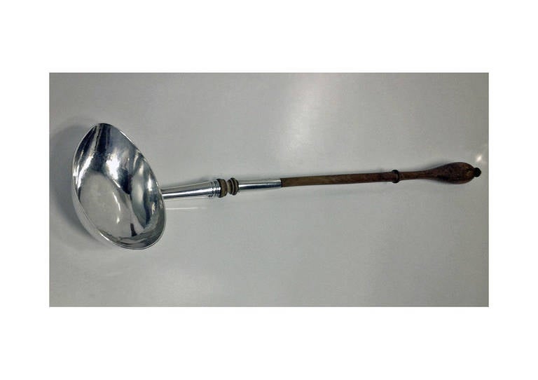 Rare Channel Island Silver 18th century Georgian Silver Toddy Ladle, Pierre Maingy, Guernsey, C.1760. The Ladle of typical Georgian style, the bowl of goose egg shape, turned wood handle. Length: 13.5 inches.