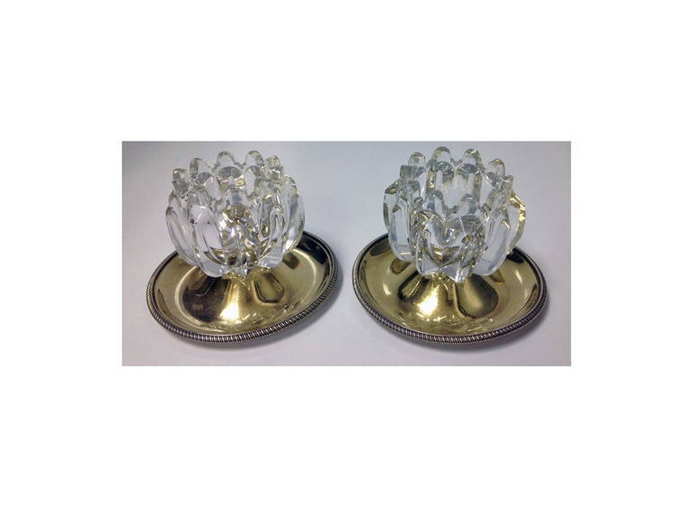Very Rare Georgian Silver Lily design Salts, London 1800, Solomon Hougham. The salts with original lightly gilded welled bases supporting a facetted panelled clear glass open Lily, plain silver hallmarked bases. Base diameter: 4.25 inches. Height: 3