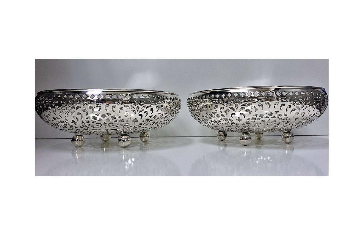Pair of Antique Sterling Silver Fruit Bowls, Shreve, Crump & Low, San Francisco, C.1900. Each on four ball feet, pierced geometric foliate bombe shape body with solid centre base. Marks for Shreve, Crump & Low on base. Measure: Approximately 8 x 3