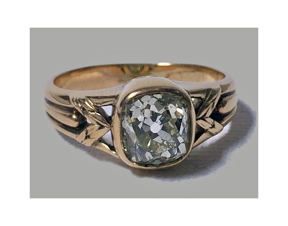 Russian Diamond and Gold Ring, St Petersburg, 1908-17, HA. The Ring set with an old cushion cut diamond gauging approximately 7.10 x 7.00 x 5.22 mm, approximately 1.65 ct, calculated by formula, approximately SI2 clarity, approximately L - M colour.