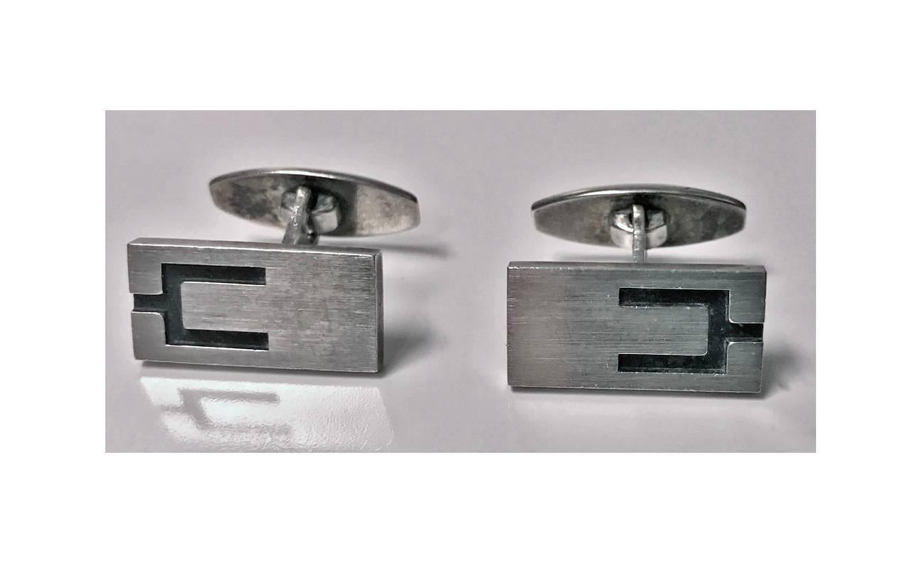 Pair of Danish Sterling Cufflinks, Niels Erik From, C.1950. The cufflinks of a plain oval striking concave form, `t’ bar fitments. Stamped Sterling Denmark N.E. From 925 S. Measures: 1 x .5 inches. Weight: 11.92 gm.